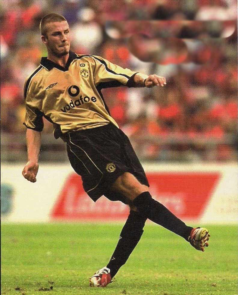 David Beckham avec le maillot vintage réversible de Manchester United 2001/2002
